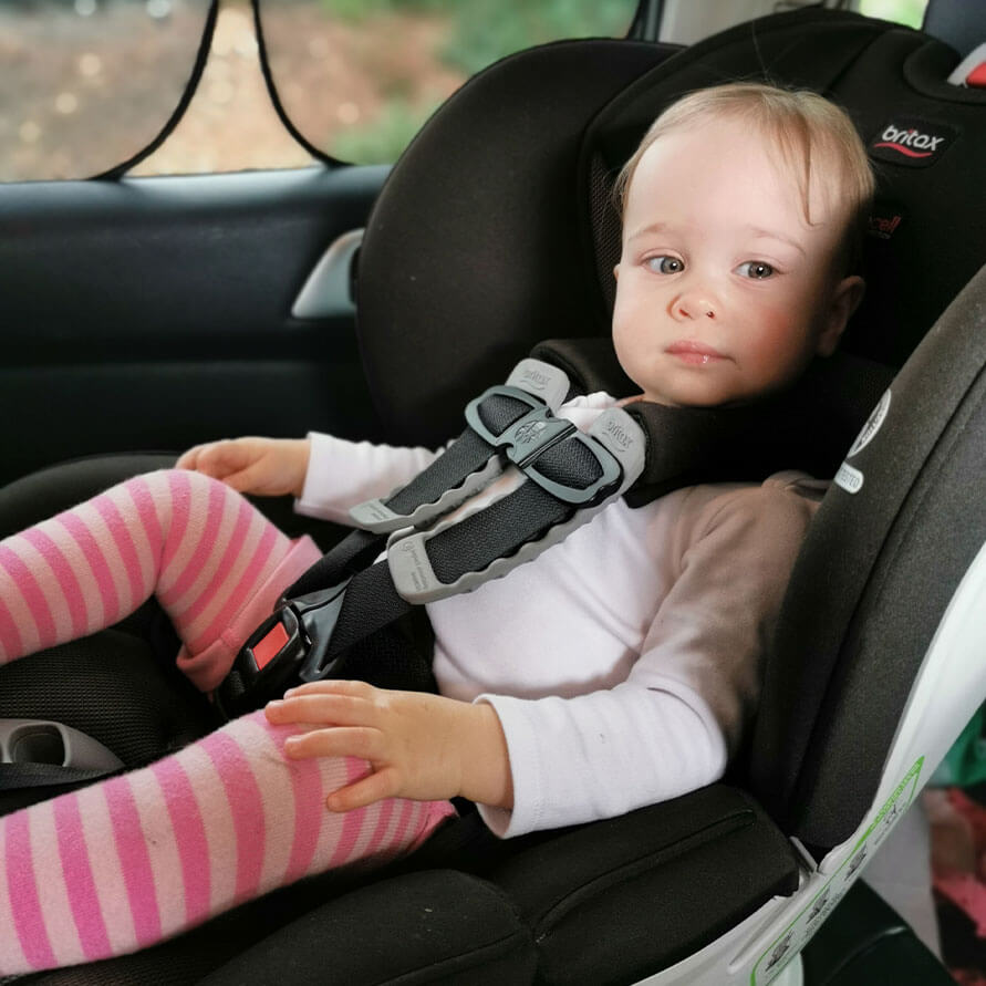 One year old in rear-facing car seat in New Zealand.  Britax Boulevard ClickTight.  US standard child restraint.
